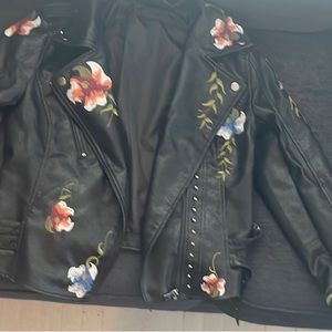 Beautiful floral embroidery leather motorcycle jacket, size small.